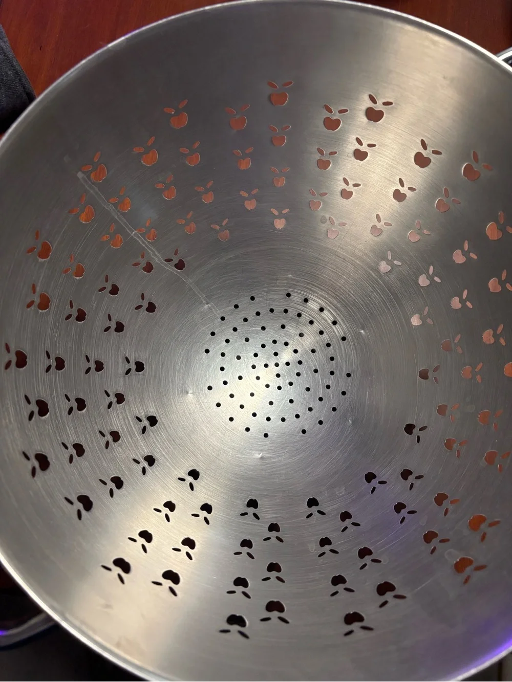 Polished Stainless Steel Strainer with Apple Cutouts - Silver